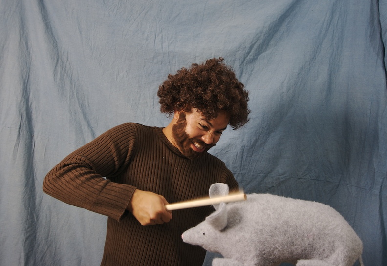 Paka's LSD kicks in. 29 items were his cowbell before we wrestled the stick from his hands. ach.jpg
