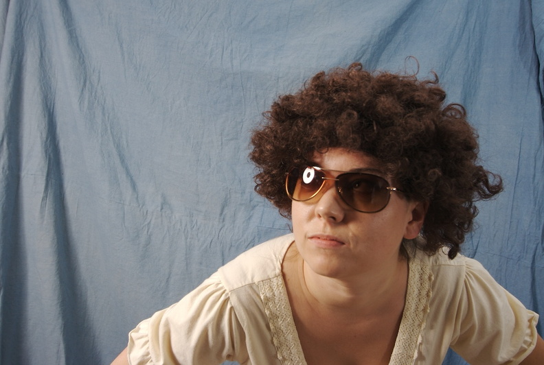 Is that a UFO, or am I just really high right now? Also, these curls are kickass. ade.jpg