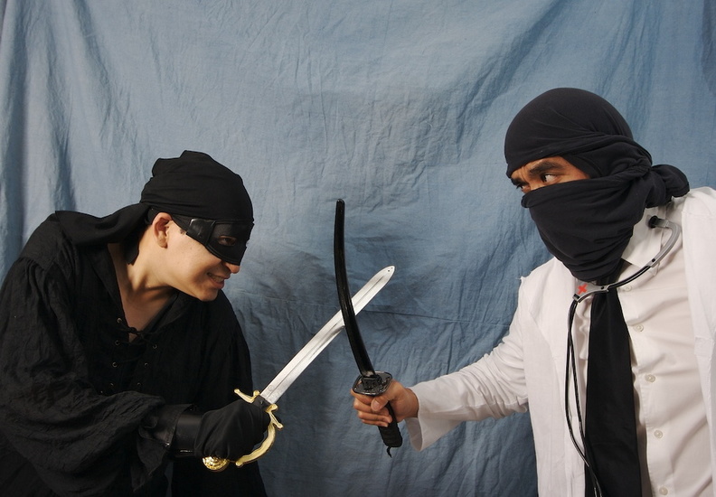 The age old battle of Pirate vs Ninja continued at the costume party. adh.jpg
