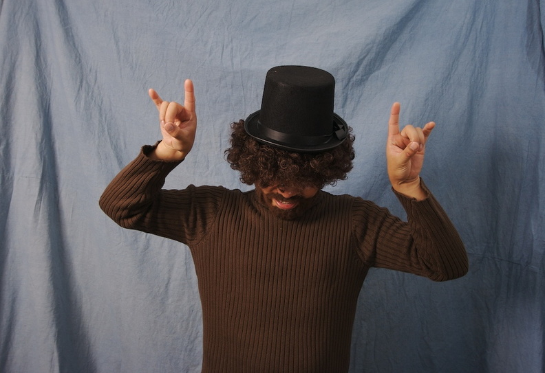 I will combat that terrible joke, and the violence against women by rocking out like Slash. adn.jpg
